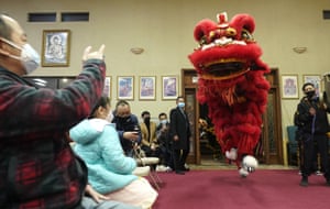 The JL Lion Dance Sports Association performs during a celebration at Dao Quang temple in Texas, US