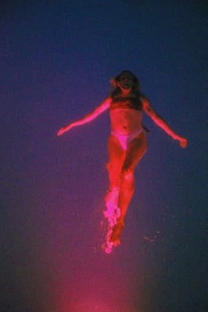Summer’s GoneWhile shooting portraits, I try to focus on how my subjects interact with light and color. I took this photo of my friend Moira floating in water, lit by colourful pool lights. I stood above her on the diving board to capture it. I try to capture the essence of a teenager living in suburbia.