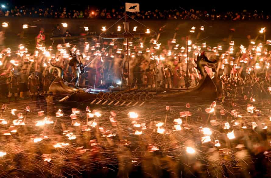 At the Up Helly Aa festival up to 1,000 Viking paraders set a galley ablaze by throwing torches into it.