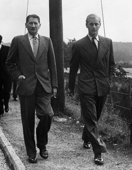 Prince Philip of Greece leaves Crathie Church at Balmoral with Michael Bowes-Lyon, the brother of Queen Elizabeth, in 1946.