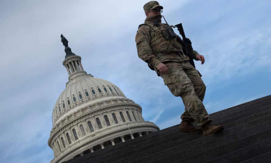 A member of the national guard provides security at the US Capitol.