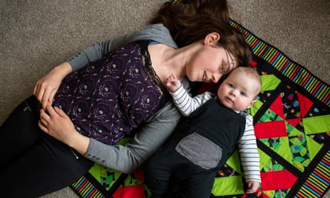 Stella Buller lying down with her son, Scott
