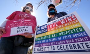 Demonstrators take part in a rally to raise awareness of anti-Asian violence, near Chinatown in Los Angeles, California