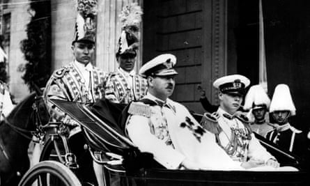 Carol II, seated left in carriage, with his son, Crown Prince Michael, in June 1939. They were on their way to the opening of parliament.