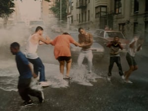 Jose Fabian Figueroa, 22, plays stickball with Frances, 23, and Tania Lopez, 24, in the orange shirt on Creston Avenue, The Bronx, 1990s