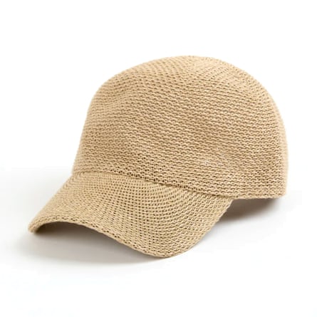 A Glassworks London Beige straw weave baseball hat on a white background