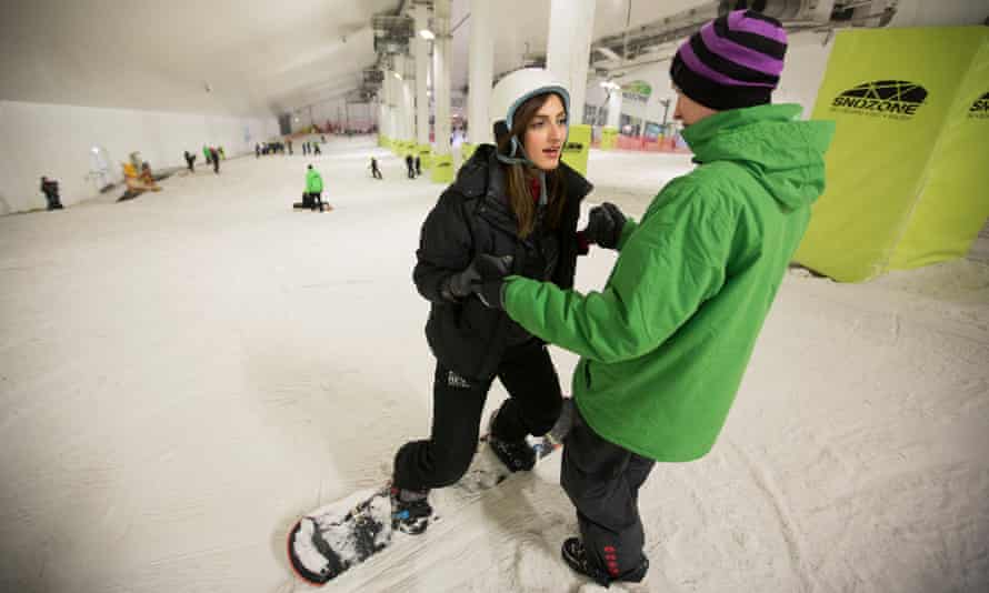 Nadia Khomami gets some snowboarding tuition.