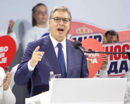 Aleksandar Vučić gives a speech while wearing a suit