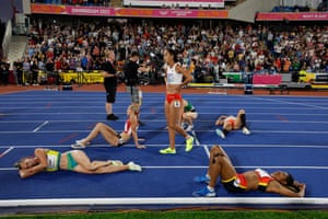 England’s Katarina Johnson-Thompson looks shocked as she takes in winning heptathlon gold as she stands amongst her competitors after the 800m race.