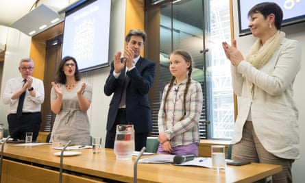 Greta Thunberg is applauded by politicians (from left) Michael Gove, Layla Moran, Ed Miliband and Caroline Lucas.