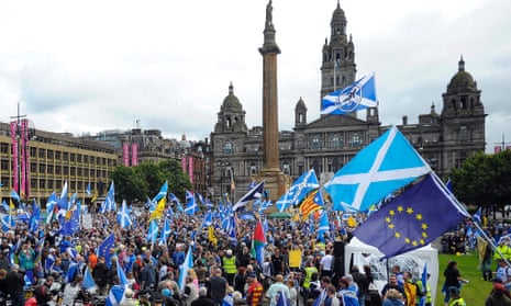 Pro-independence supporters with saltire and EU flags at a rally in George Square, Glasgow, soon after the 2016 Brexit vote.