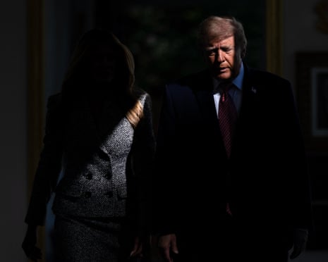 Shadowy silhouettes of man and woman walking