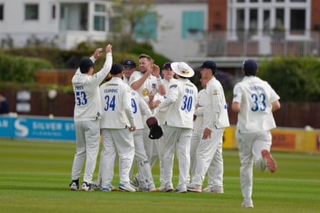 Ollie Robinson of Sussex takes the wicket of Alex Davies