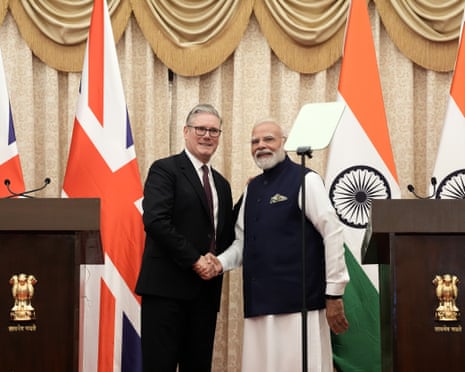 Britain's prime minister Keir Starmer and India's prime minister Narendra Modi shake hands after delivering a statement to the press at Raj Bhavan in Mumbai, India, on Thursday, 9 October 2025.