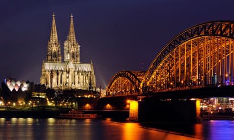 the Hohenzollern Bridge and Cologne Cathedral.