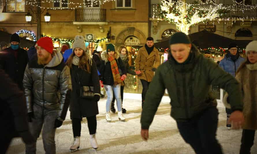 People ice skating on the Old Market Square in Warsaw, Poland on 7 December.