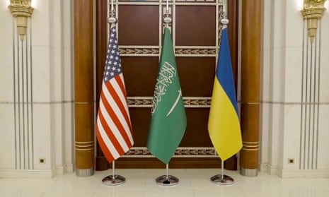 Flags of Saudi Arabia, Ukraine and US, during meeting with US and Ukrainian officials in Jeddah, Saudi Arabia.