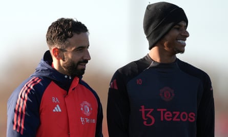 Ruben Amorim (left) and Marcus Rashford in training