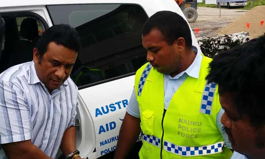 Nauru MP Mathew Batsiua in handcuffs