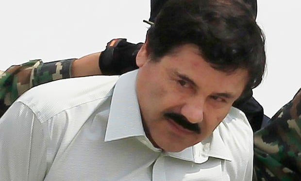 Joaquin ‘El Chapo’ Guzmán is escorted by soldiers after a previous capture on 22 February 2014.