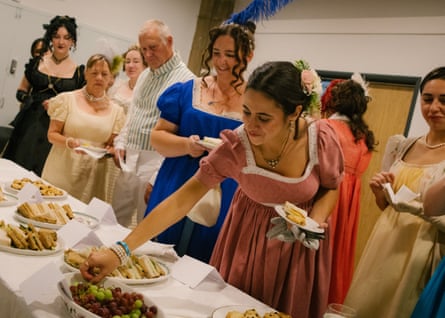 People take food from a table