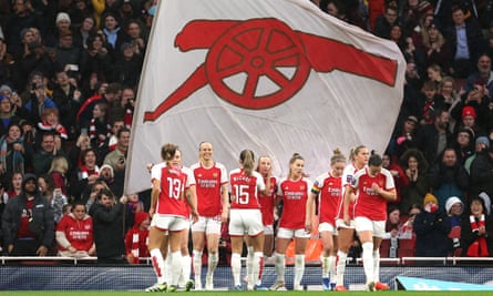 Beth Mead of Arsenal (obscured) celebrates after scoring their team’s first goal with teammates