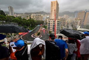 Monaco: Spectators wait in the rain for the start of the Monaco Formula 1 Grand Prix