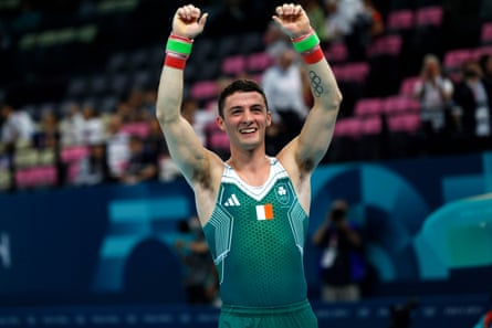 Rhys McClenaghan punches the air after taking gold in the men’s pommel horse final at Paris 2024.