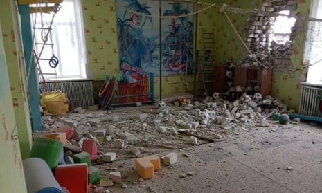 A kindergarten in Stanytsia Luhanska, Ukraine, which Ukrainian Joint Forces said had been shelled. The US has accused Russia of a false-flag operation to justify a Russian invasion. Follow the latest news