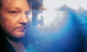 Assange leaves the London court Wednesday after being sentenced to 50 weeks in prison.