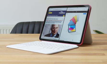 The iPad in the Magic Keyboard Folio used as a laptop replacement on a table.