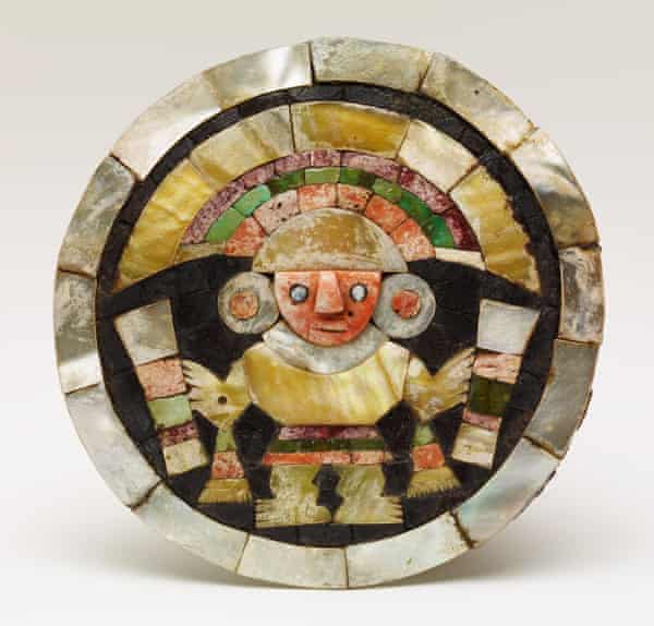 Peru before Peru … Earplug depicting a mythical figure, Lambayeque AD 900–1300/50. Wood and mother-of-pearl, shell H 10.5 cm, W 8.8 cm.