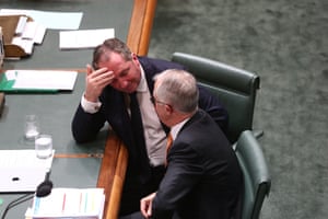 Deputy PM Barnaby Joyce talks to the prime minister, Malcolm Turnbull, during question time.