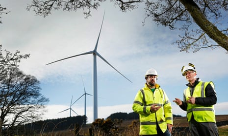 Alan Hobbett of Berwickshire Housing Association, left, with Jamie Adam of Community Energy Scotland at Hoprigshiels windfarm near Cockburnspath, Scotland