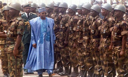 Sani Abacha, the Nigerian military dictator, with troops in 1998.