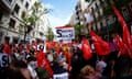 A demonstrator holds up a sign reading 'Sánchez gets on, yes' outside the PSOE headquarters in Madrid on Saturday.
