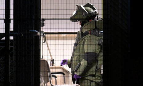A member of a bomb disposal team works performs routine checks after several people were killed or seriously injured in a shooting at a Jehovah's Witness church in the northern German city of Hamburg, Germany, 10 March 2023.
