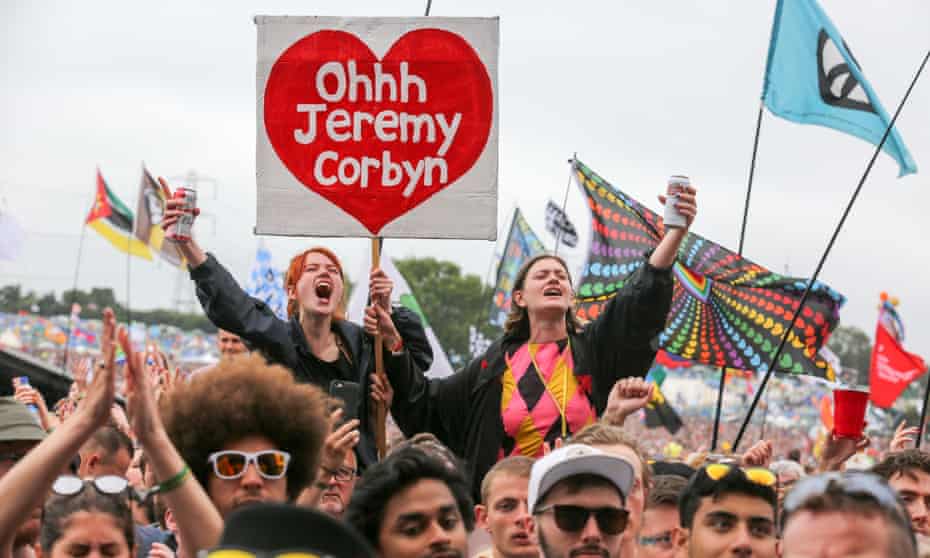 Festival-goers cheer for Jeremy Corbyn at Glastonbury, 2017