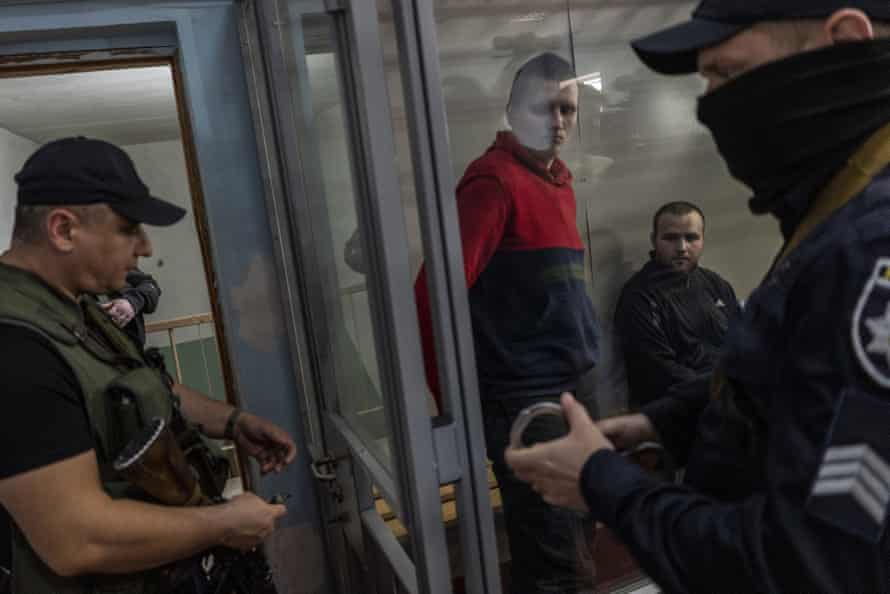 Russian soldiers Alexander Bobikin and Alexander Ivanov pictured at their trial in Kotelva, northeastern Ukraine, on Thursday 26 May.