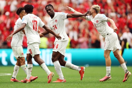 Promise David celebrates after scoring Canada's first goal against Switzerland.
