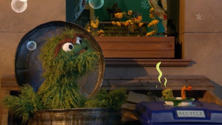 Oscar the Grouch’s iconic trash can has been joined by a recycling bin.