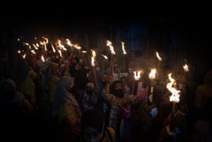 Indonesian Muslim students with torches