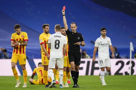 Real Madrid’s Toni Kroos is shown a red card by the referee in the 1-1 draw with Girona.