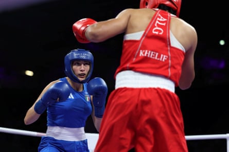 Italy’s Angela Carini (left) abandoned her bout against Imane Khelif of Algeria after 46sec.