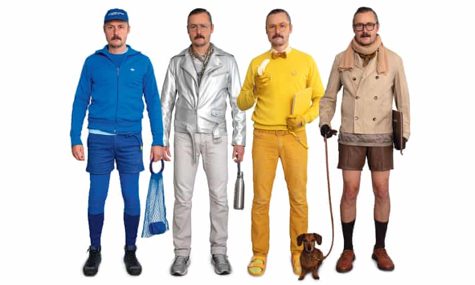 Monoclo man in blue, silver, yellow and brown outfits