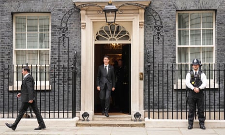 Canadian Prime Minister Justin Trudeau leaves after visiting 10 Downing Street to meet with British Prime Minister Liz Truss in London on Sunday, September 18, 2022, ahead of the funeral service for the late Queen Elizabeth II.