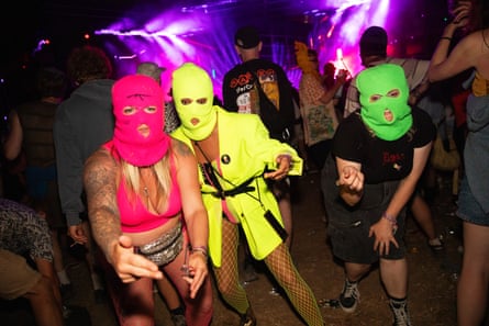 Justine, Rebecca and Megan dancing in balaclavas at Levels.