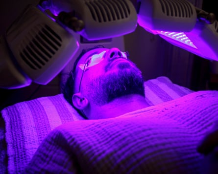 Sammy Gecsoyler receiving violet LED light treatment