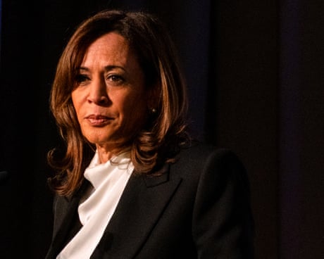 a woman slightly to her left