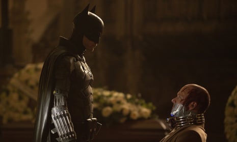 Robert Pattinson, left, and Peter Sarsgaard in a scene from The Batman.